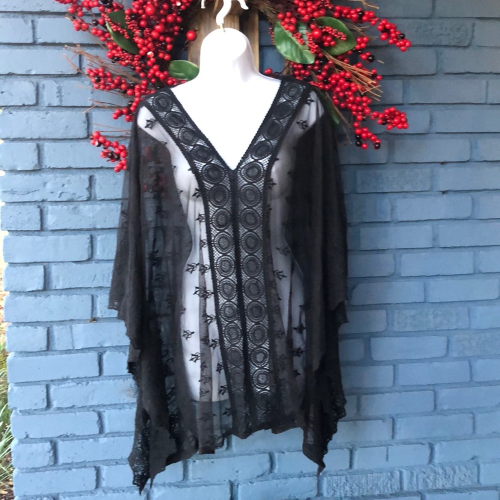 Beautiful sheer lace top with butterfly sleeves